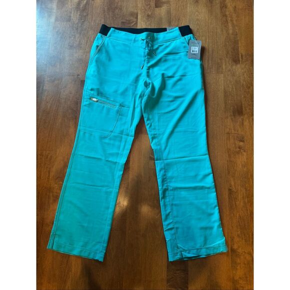 Woman’s new with Tags healing hands 360 scrub pants size large teal - Picture 1 of 6